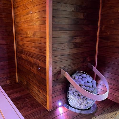 HUUM Drop sauna heater review unboxing showing components and stones