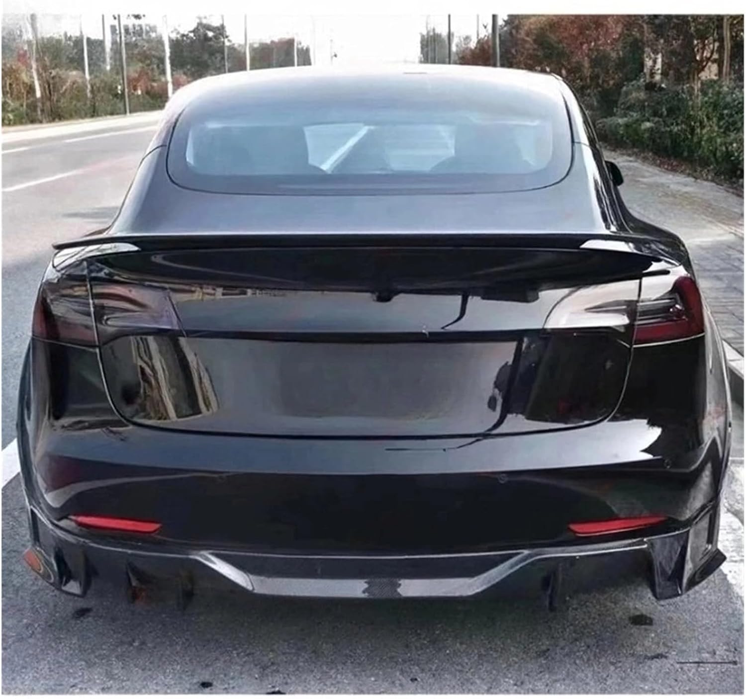 best carbon fiber body kit for model 3,model 3 carbon fiber kit worth buying,tesla model 3 aerodynamic kit pros cons,should I buy a forged carbon fiber kit,model 3 body kit vs alternatives,carbon fiber aerodynamic kit for tesla performance testing and real-world results