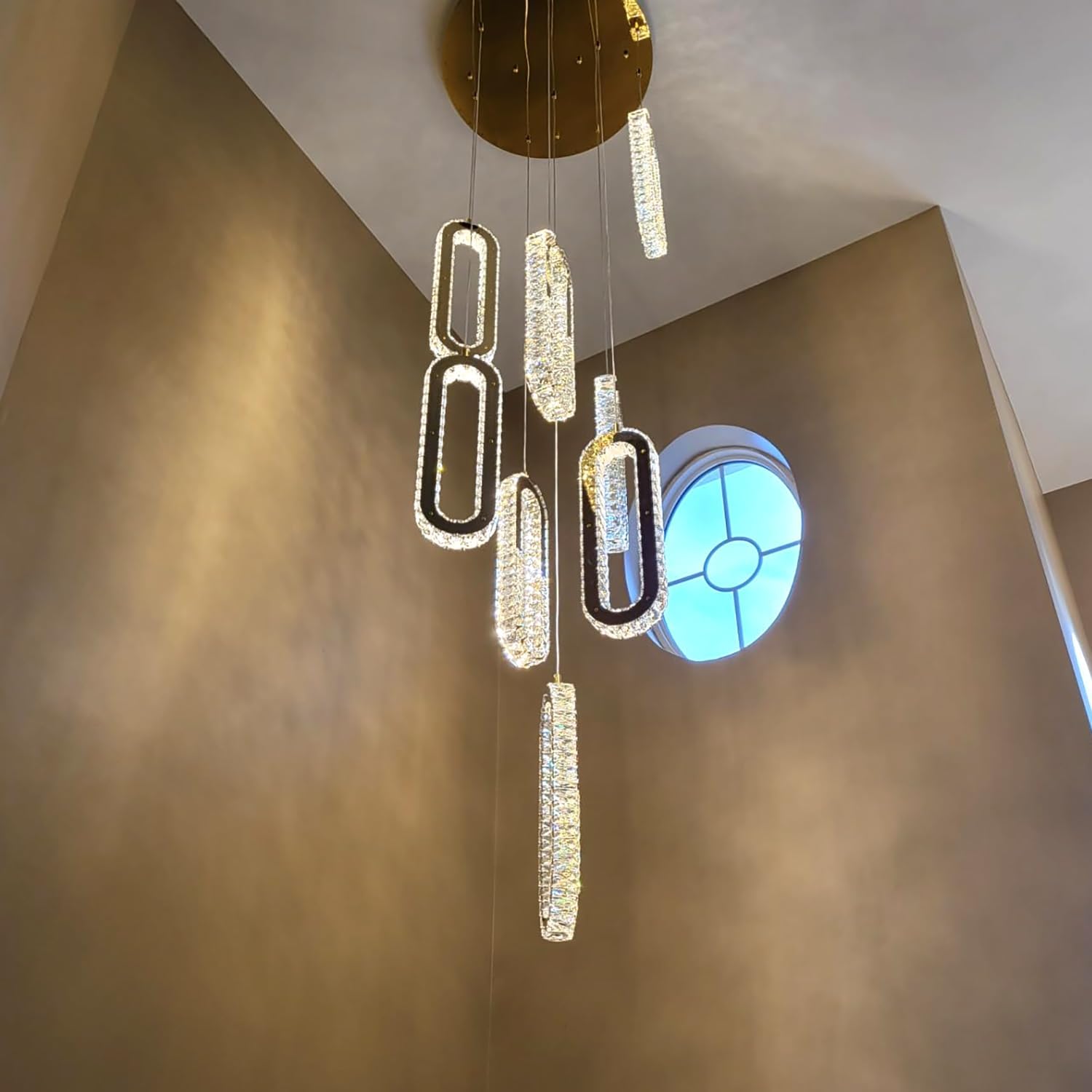 ykolupty H138 chandelier worth buying,should I buy ykolupty H138,ykolupty H138 pros cons,best high ceiling crystal chandelier,ykolupty H138 vs alternatives,modern oval ring chandelier honest performance testing and real-world results